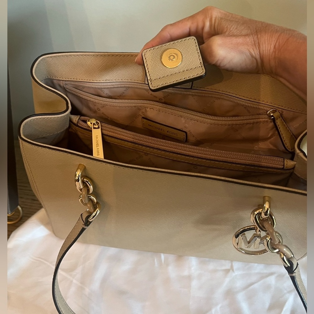 Michael Kor’s tan purse. Barely used! $100
